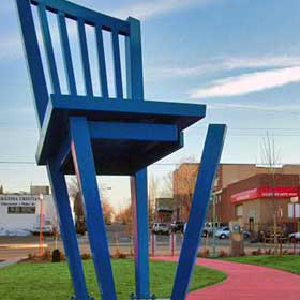 https://thebigchairco.com.au/wp-content/uploads/2023/03/Colorado-16-Foot-Tall-Blue-Chair-on-Three-Legs.webp